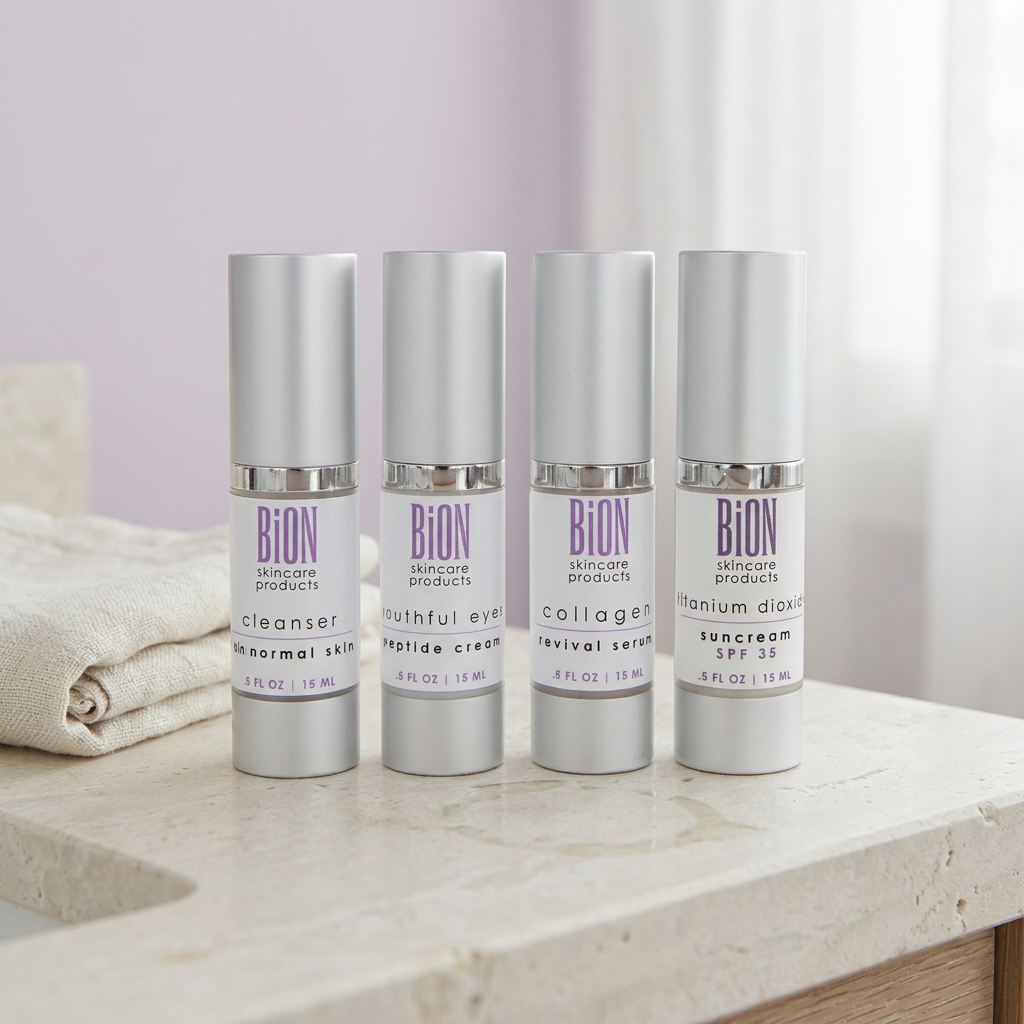 BiON Skin Rejuvenation Kit four silver bottles on pale stone beside ivory linen
