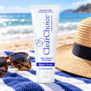Clear Choice Sport Shield SPF 45 sunscreen with sunglasses and a sun hat at the beach